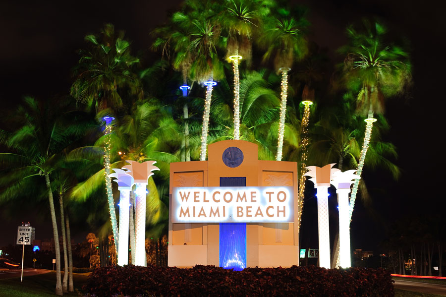 Welcome sign entering in Miami beach at night. Photo credit ShutterStock.com, licensed.