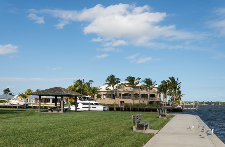 Waterfront homes and boats in Vero Beach, Florida. Photo credit ShutterStock.com, licensed.